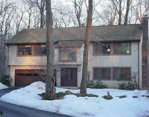 29 Round Lake Road Ridgefield, CT 06877 - Photo 1 of 1 a front view of a house with a yard