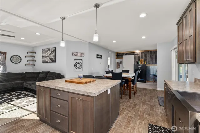 a open kitchen with a table and chairs in it