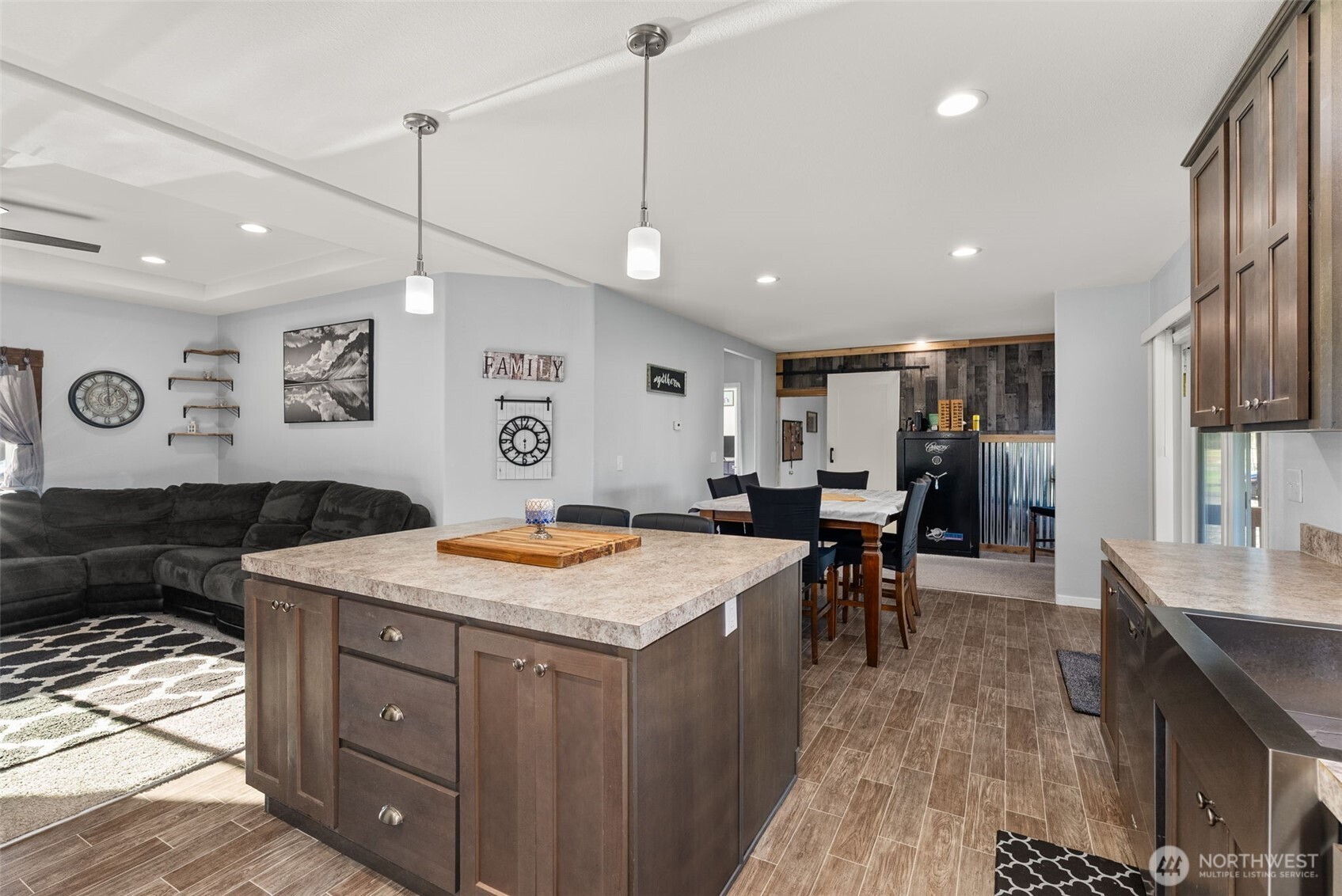 205 Antrim Road Winlock, WA 98596 - Photo 11 of 30 a open kitchen with a table and chairs in it