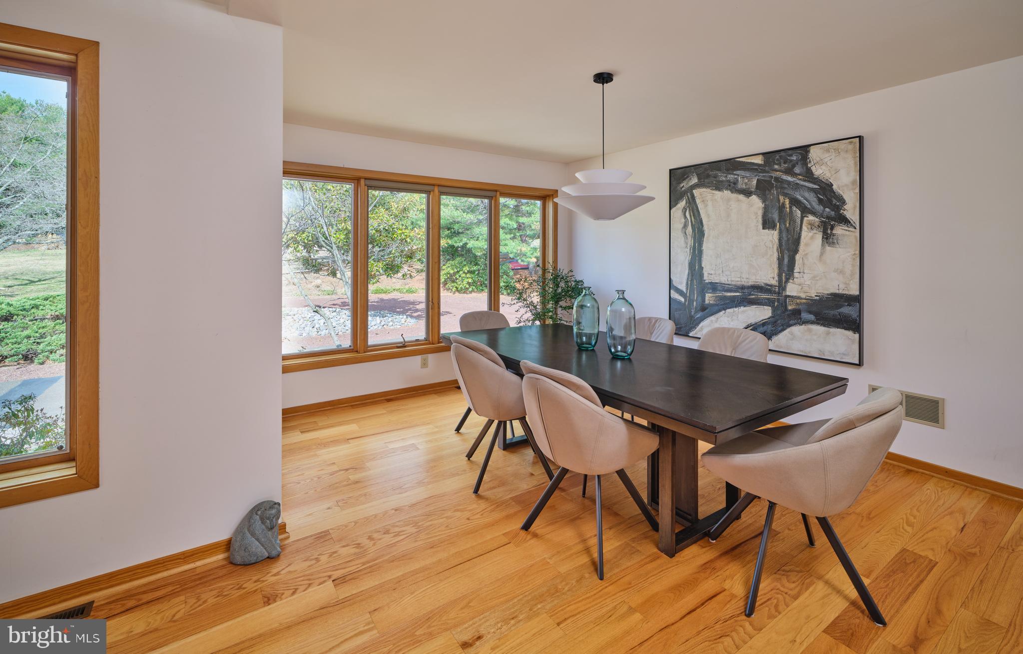 3054 Comfort Road New Hope, PA 18938 - Photo 13 of 64 a dining room with furniture and wooden floor