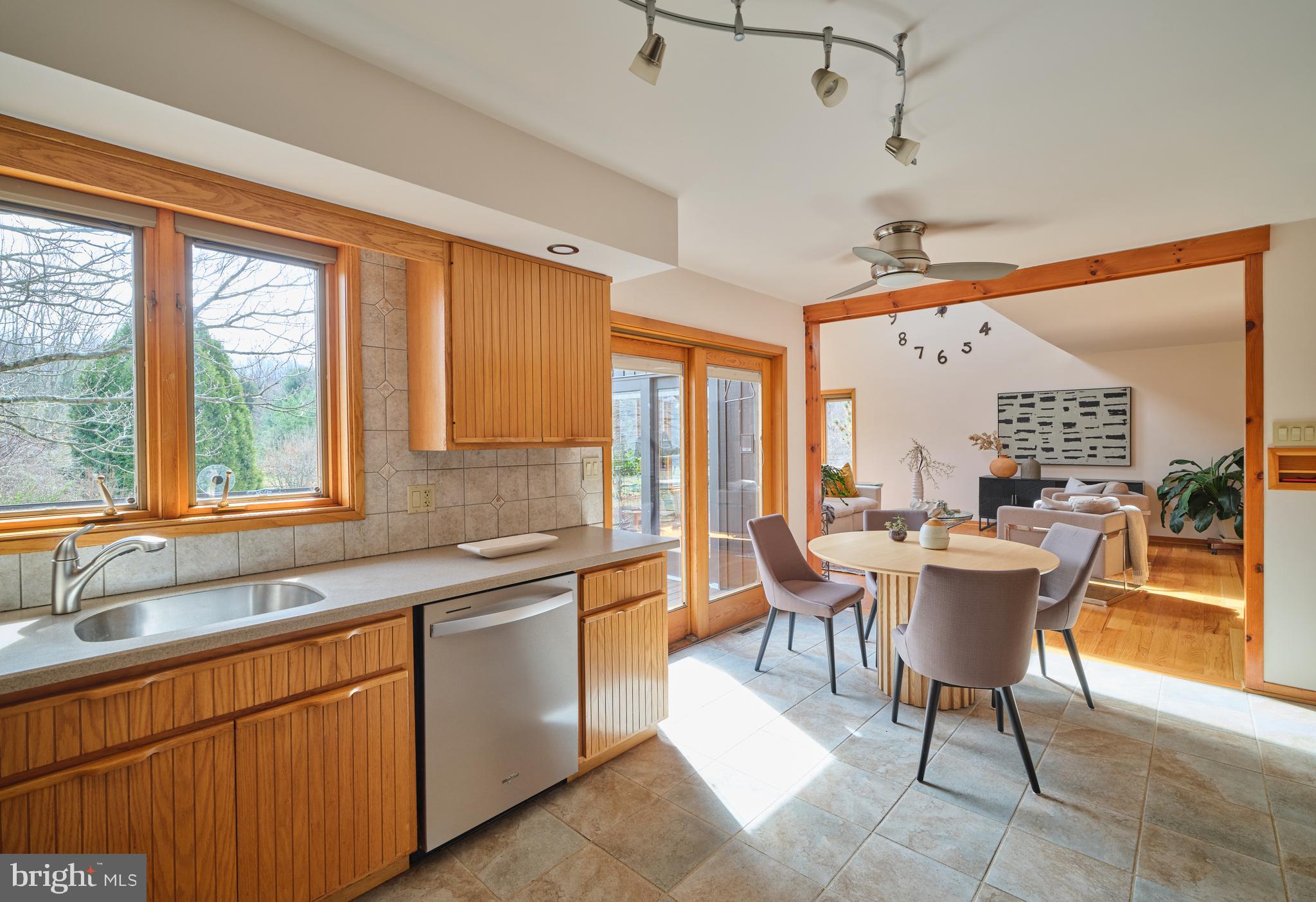 3054 Comfort Road New Hope, PA 18938 - Photo 16 of 64 a dining hall with stainless steel appliances granite countertop a sink and a large window