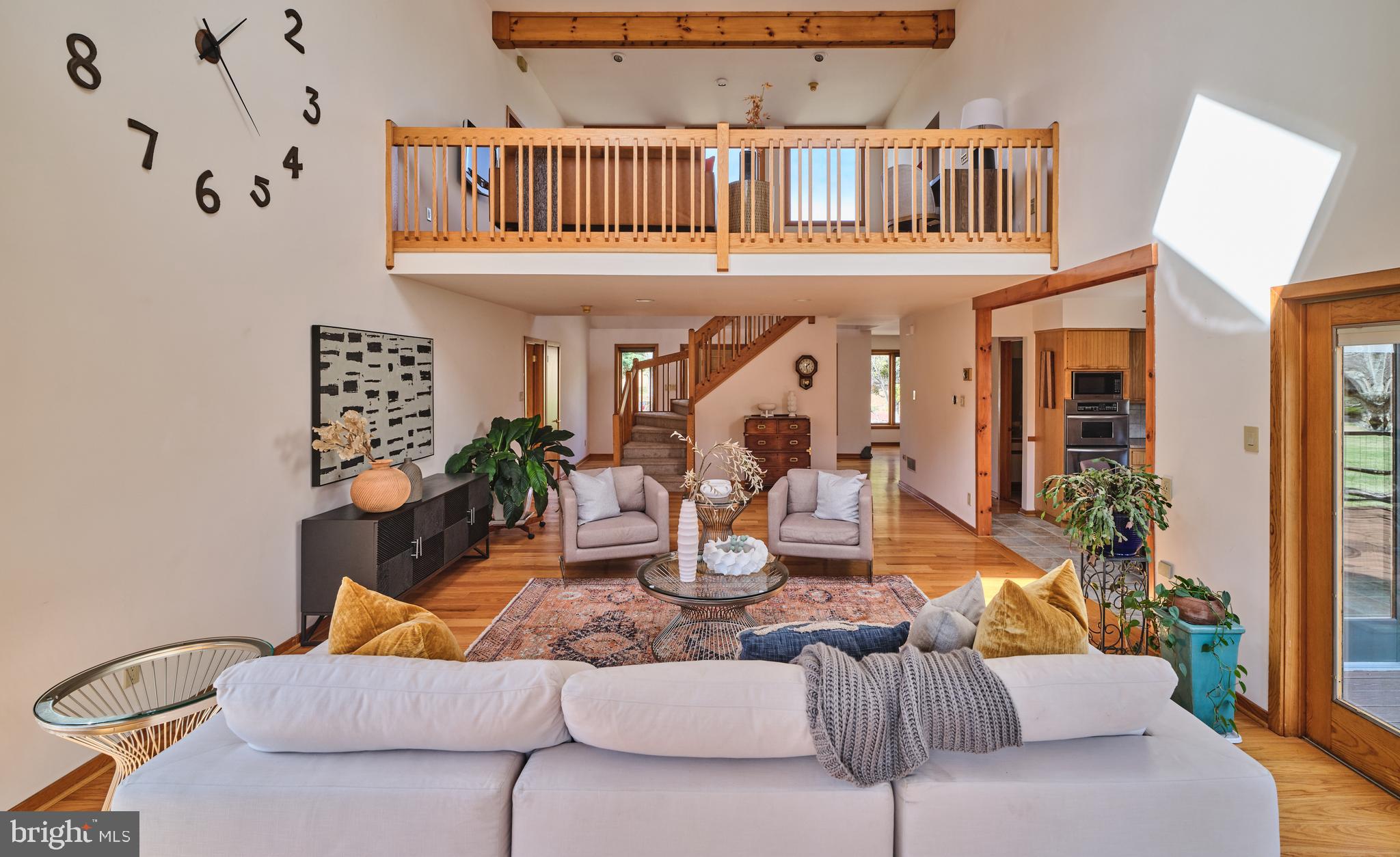 3054 Comfort Road New Hope, PA 18938 - Photo 18 of 64 a living room with furniture a rug and a clock