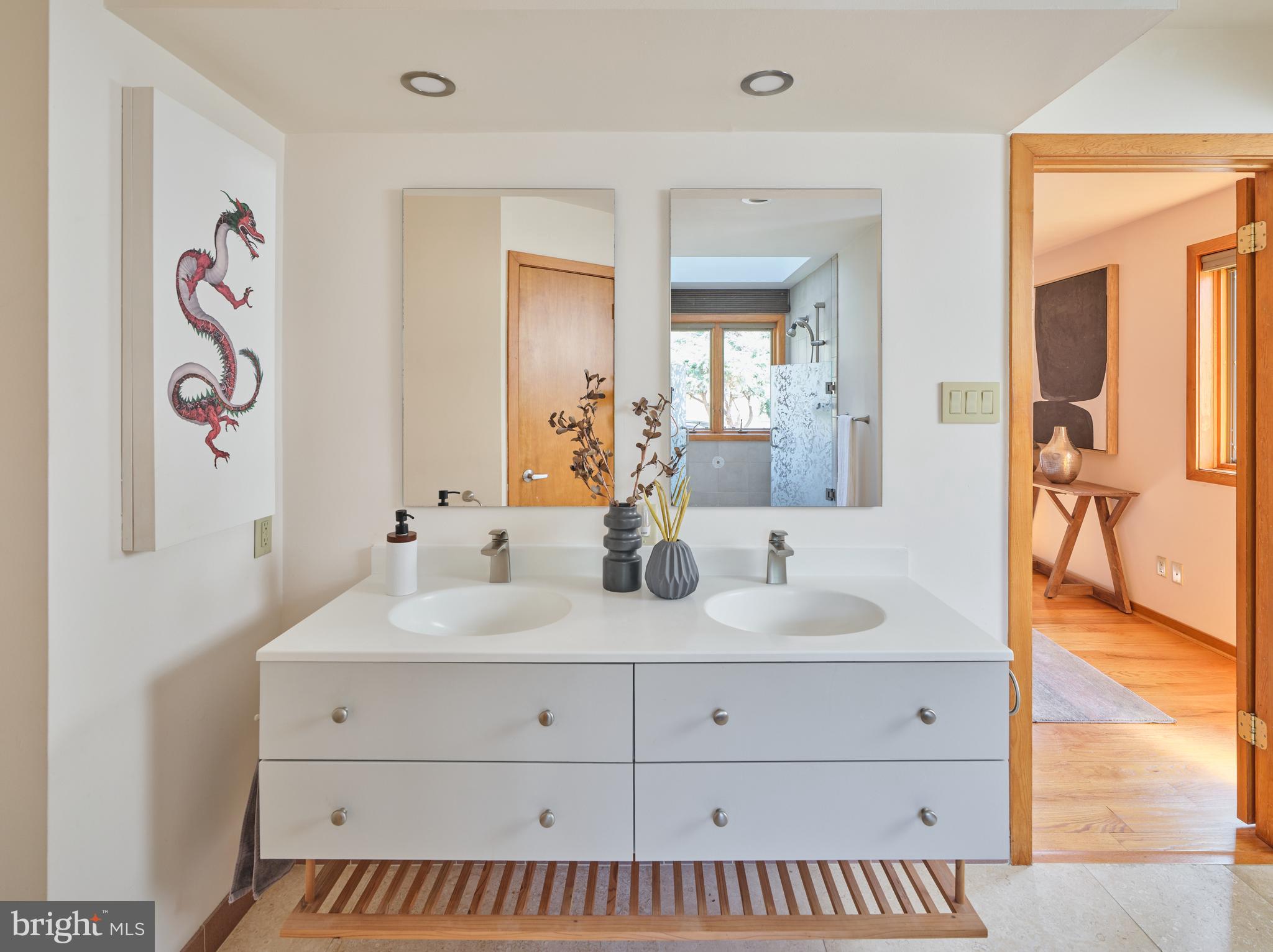 3054 Comfort Road New Hope, PA 18938 - Photo 23 of 64 a bathroom with a sink and a mirror