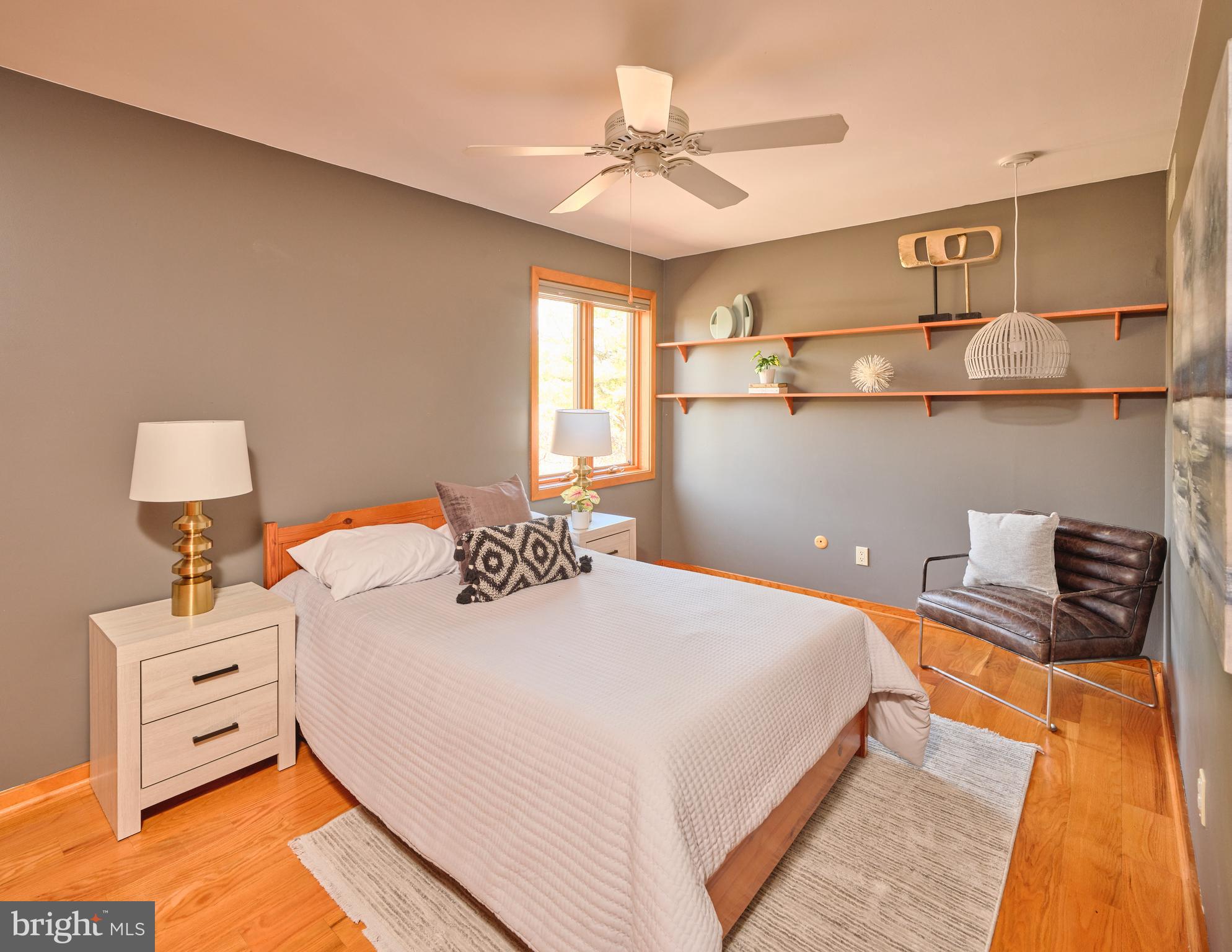 3054 Comfort Road New Hope, PA 18938 - Photo 30 of 64 a bedroom with a bed and wooden floor