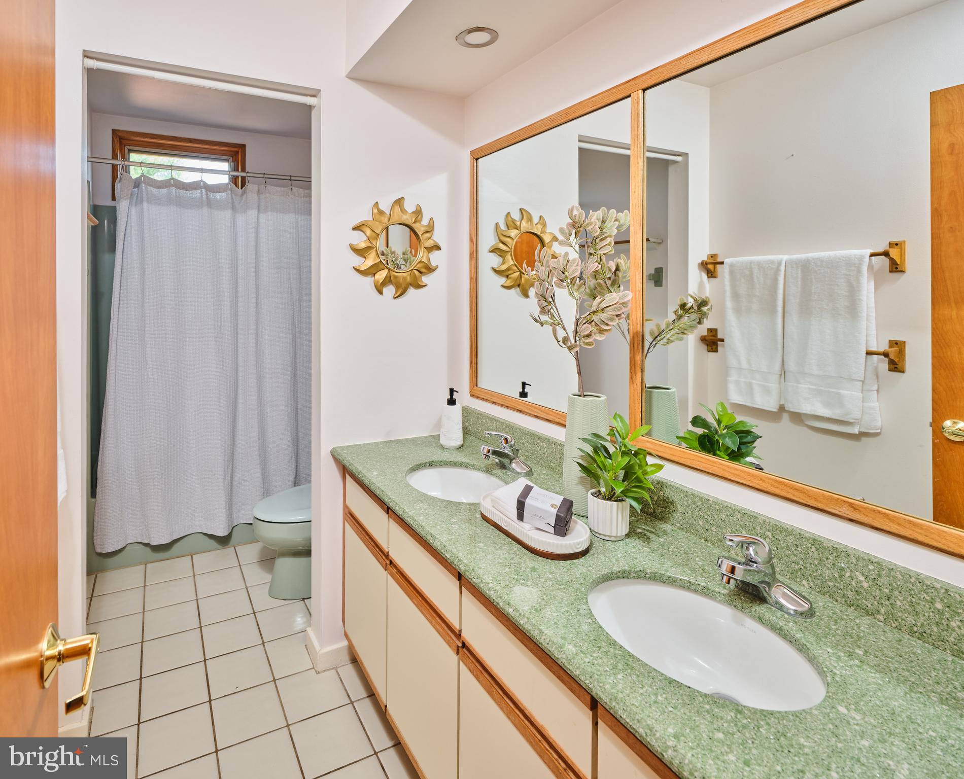 3054 Comfort Road New Hope, PA 18938 - Photo 31 of 64 a spacious bathroom with a granite countertop sink and a mirror