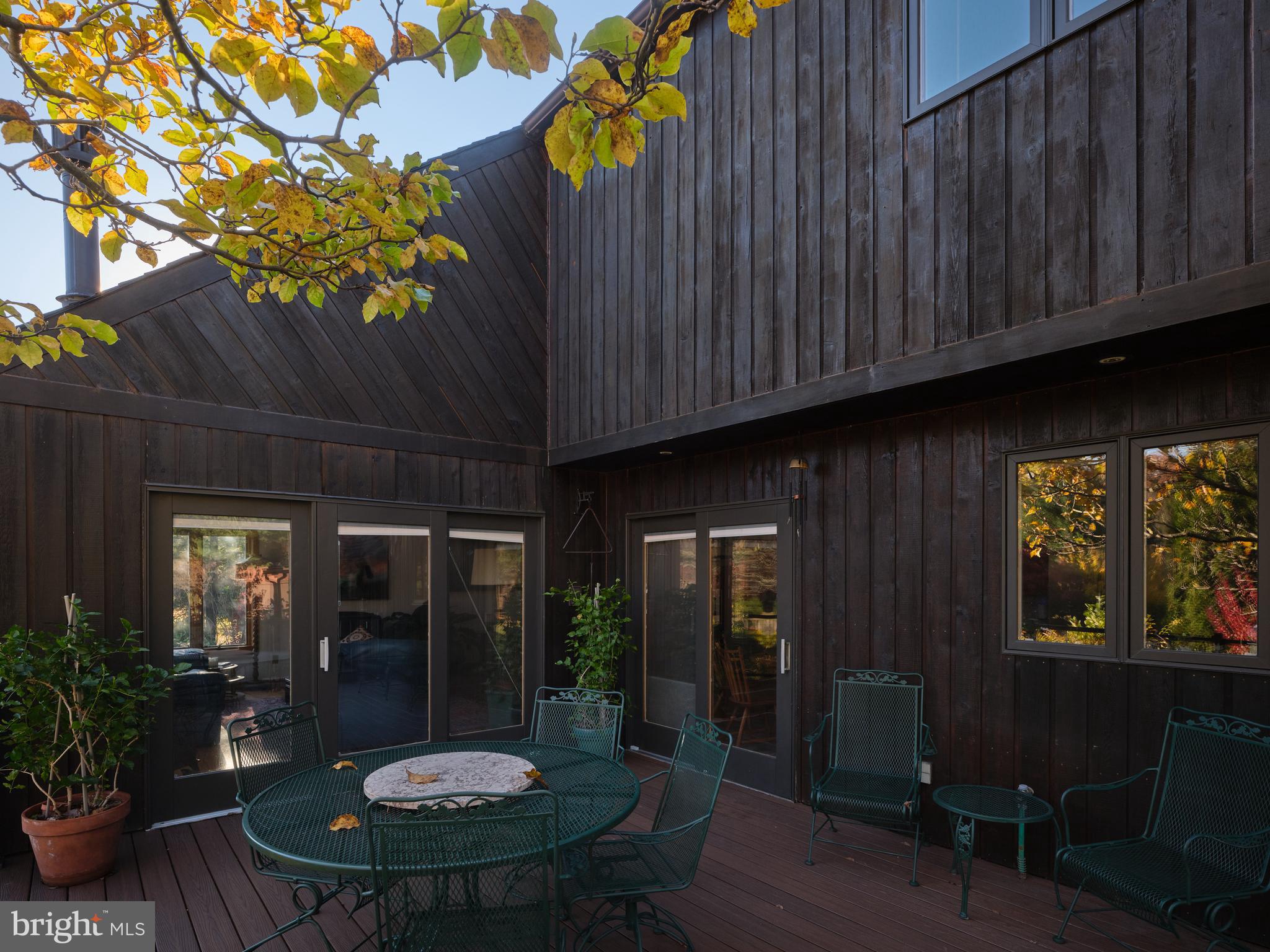 3054 Comfort Road New Hope, PA 18938 - Photo 41 of 64 a table with chairs and potted plant