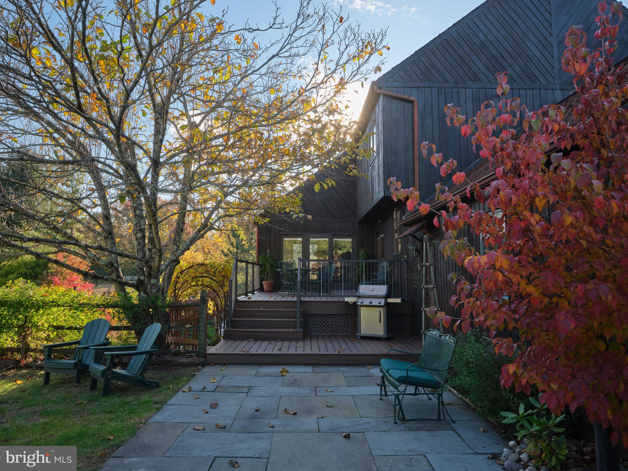 3054 Comfort Road New Hope, PA 18938 - Photo 42 of 64 a front view of a house with garden and sitting area