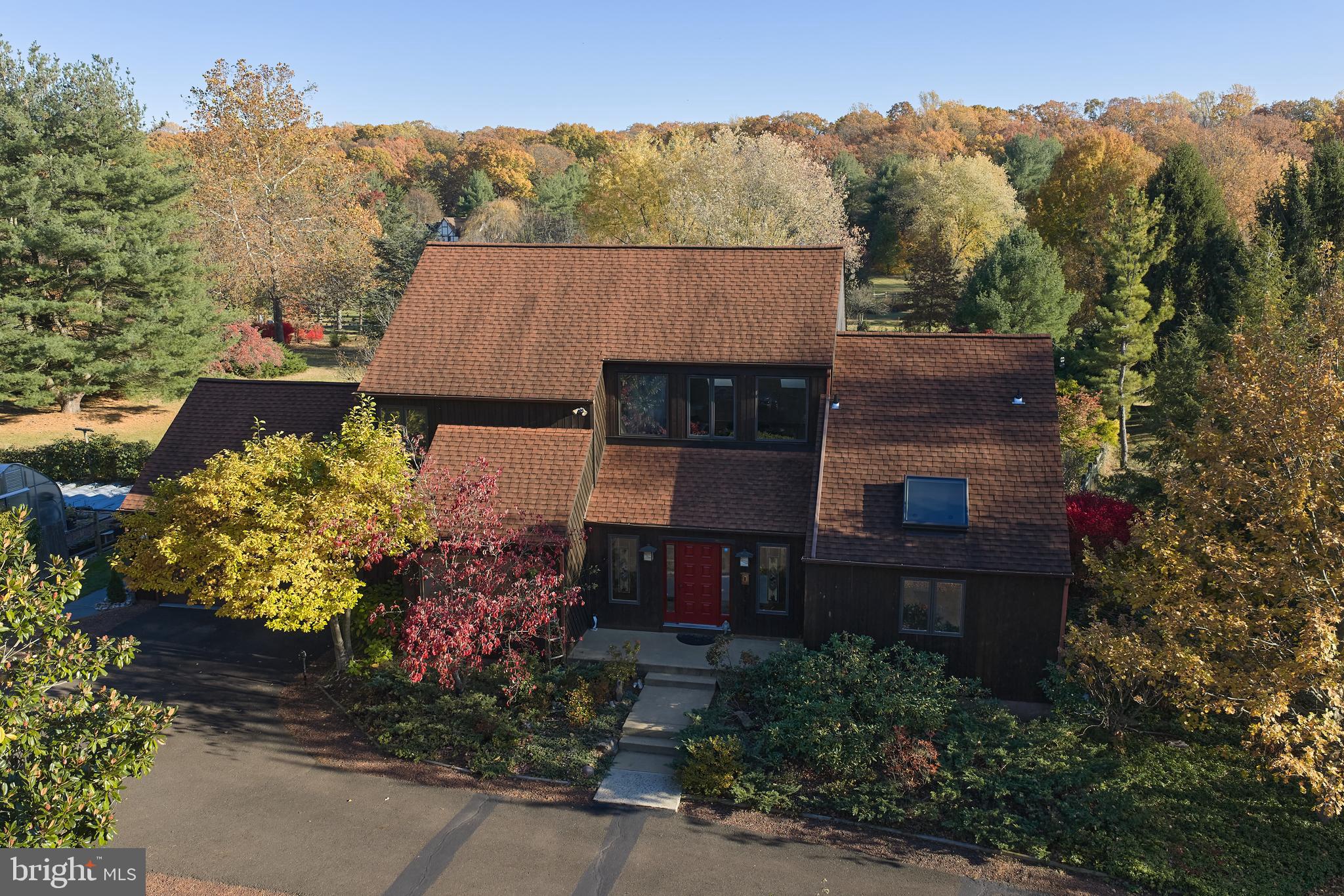 3054 Comfort Road New Hope, PA 18938 - Photo 64 of 64 an aerial view of a house with a yard and garden