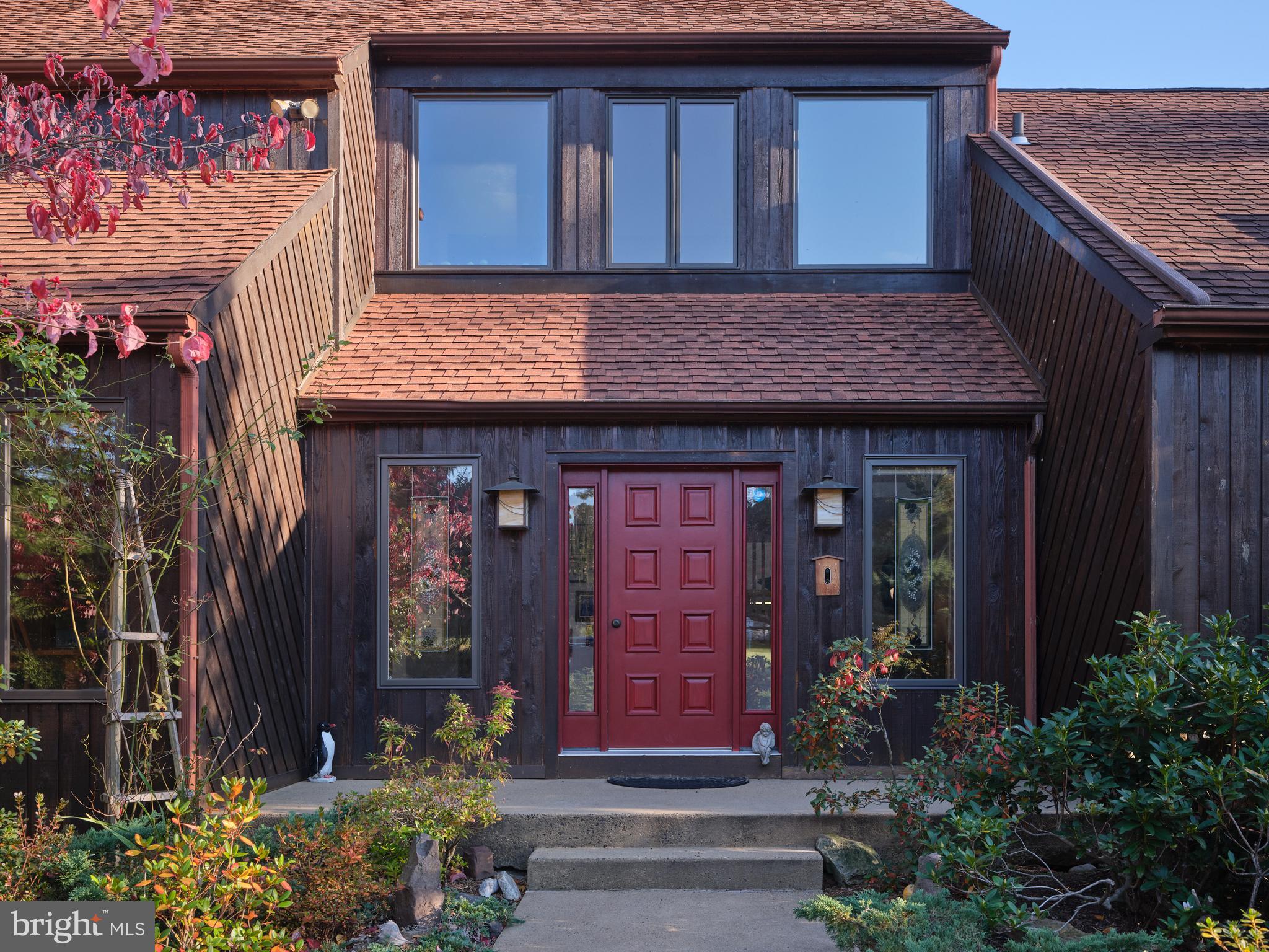 3054 Comfort Road New Hope, PA 18938 - Photo 8 of 64 a view of brick house with potted plants