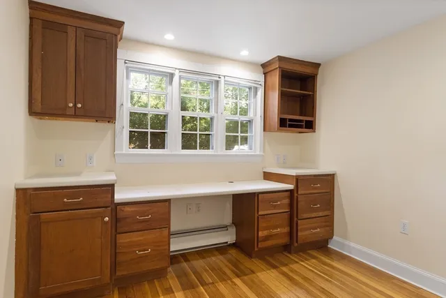 a kitchen with a sink and a window