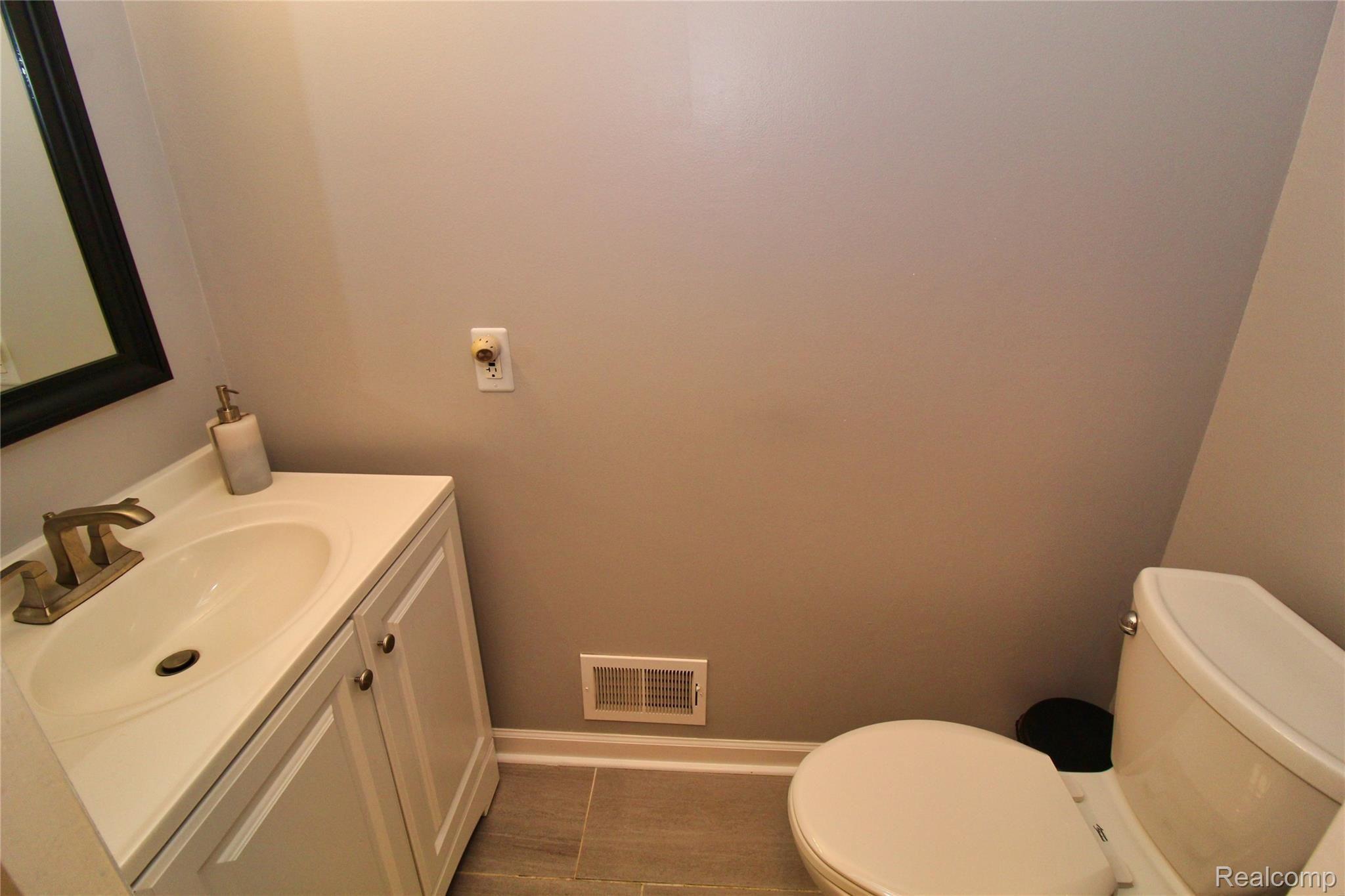 32464 Woody Road Fraser, MI 48026 - Photo 25 of 43 32464+Woody+Fraser-24-original-Half+Bathroom.jpeg