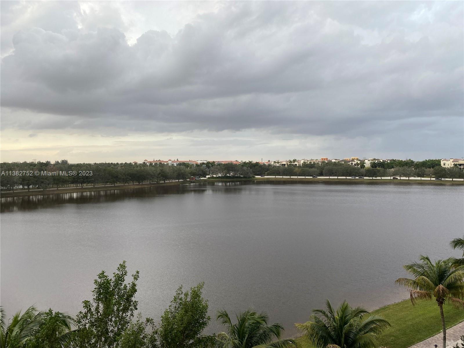 2681 North Flamingo Road, Unit 604S Sunrise, FL 33323 - Photo 12 of 18 a view of a lake with a city