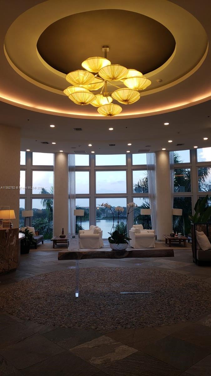 2681 North Flamingo Road, Unit 604S Sunrise, FL 33323 - Photo 10 of 18 a view of a lobby with a floor to ceiling windows