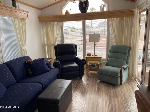 a living room with furniture and a window