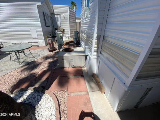 a view of a balcony with chairs