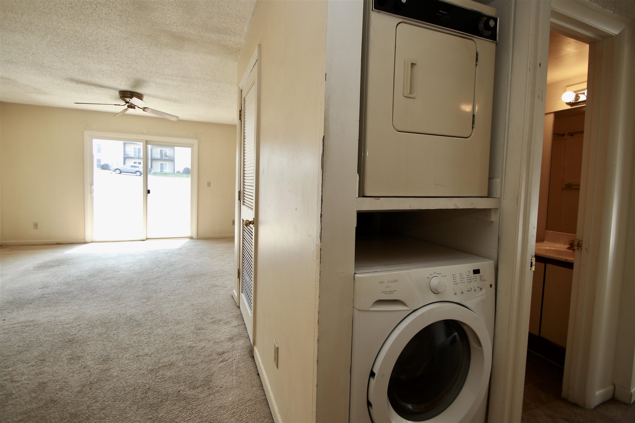 1360 Hunters Road, Unit A Harrisonburg, VA 22801 - Photo 7 of 13 a view of a hallway with washer and dryer