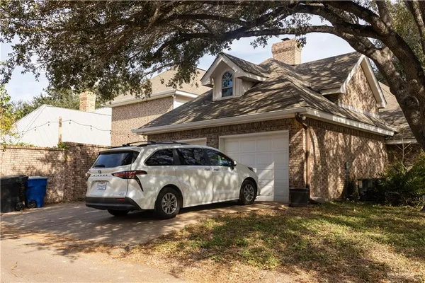 a car parked in front of a house