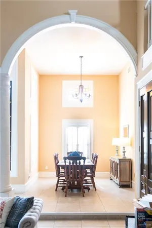 a view of a dining room with furniture window and outside view