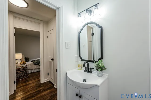 a view of a room that has a table and chair in it