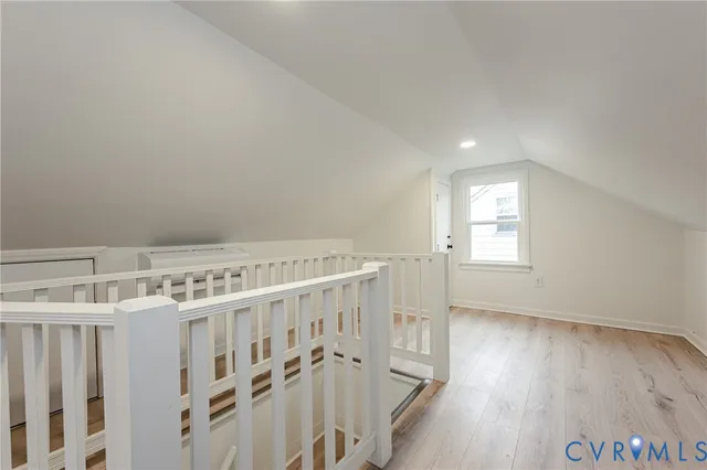 a view of entryway with wooden floor