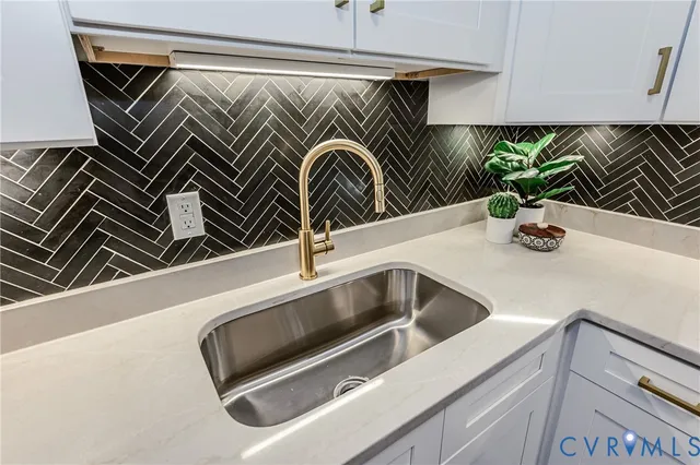 a view of kitchen and sink dining room in the house