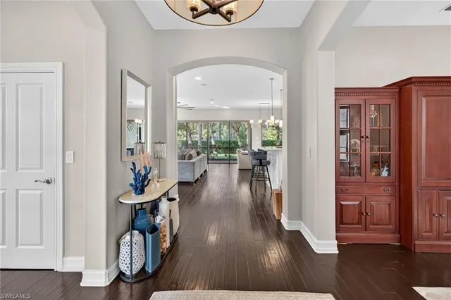 a view of entryway with wooden floor