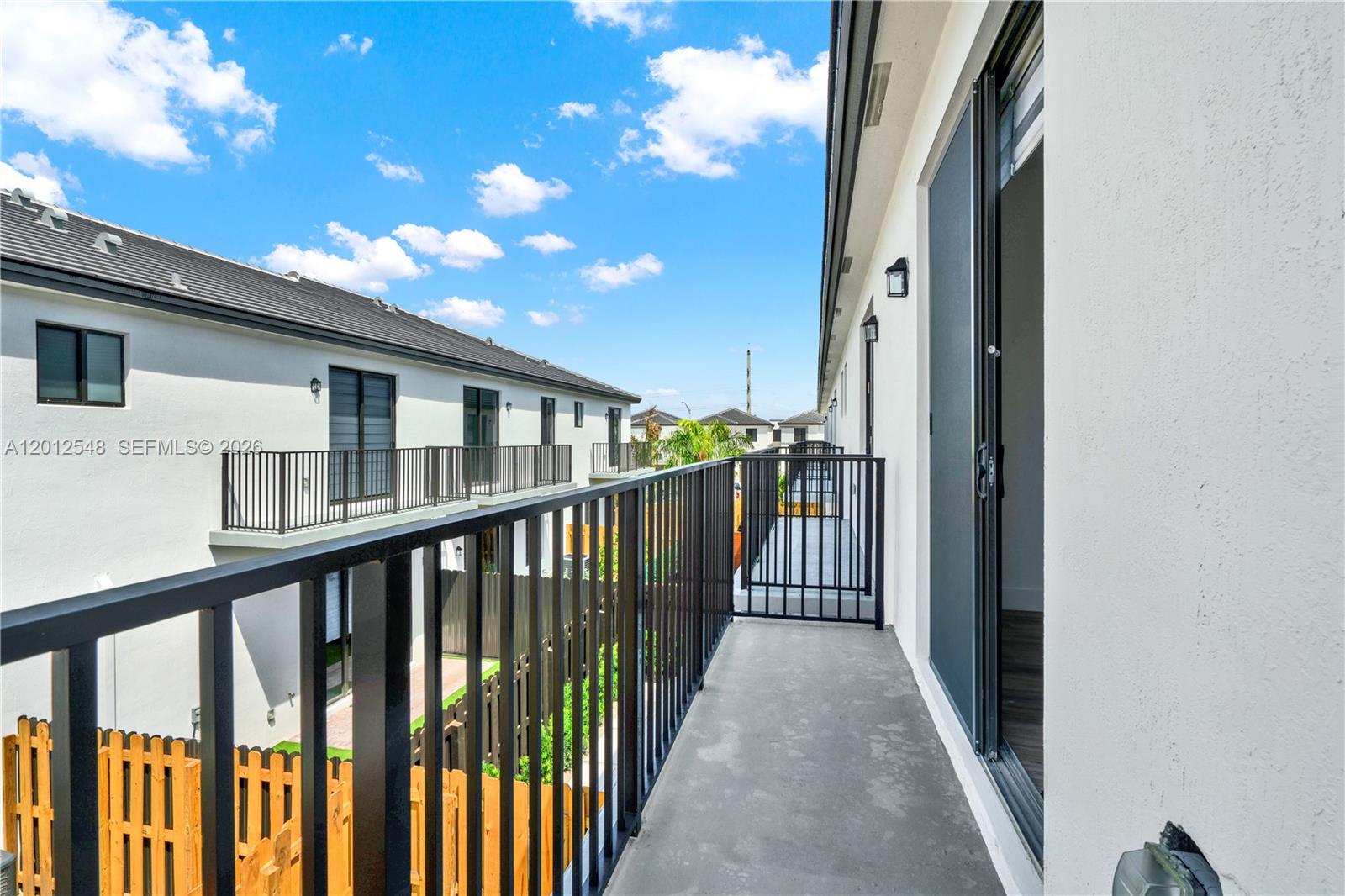 13642 Southwest 157th Place, Unit 13642 Miami, FL 33196 - Photo 22 of 41 a view of a balcony