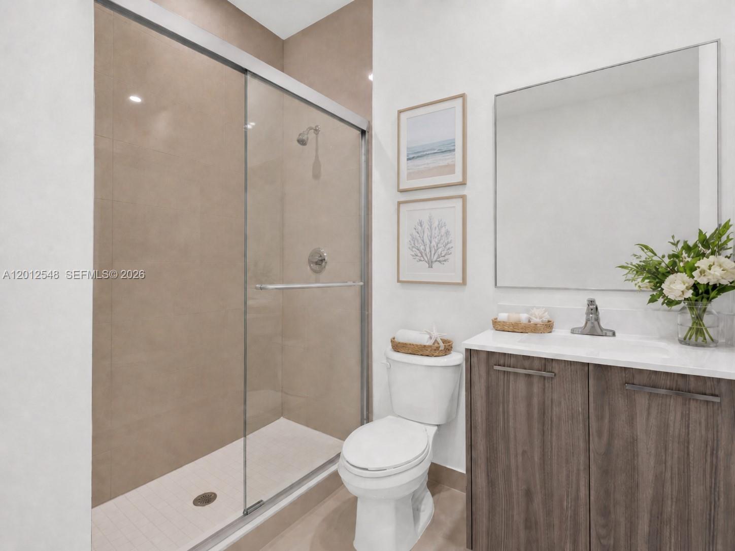 13642 Southwest 157th Place, Unit 13642 Miami, FL 33196 - Photo 30 of 41 a bathroom with a sink toilet and shower