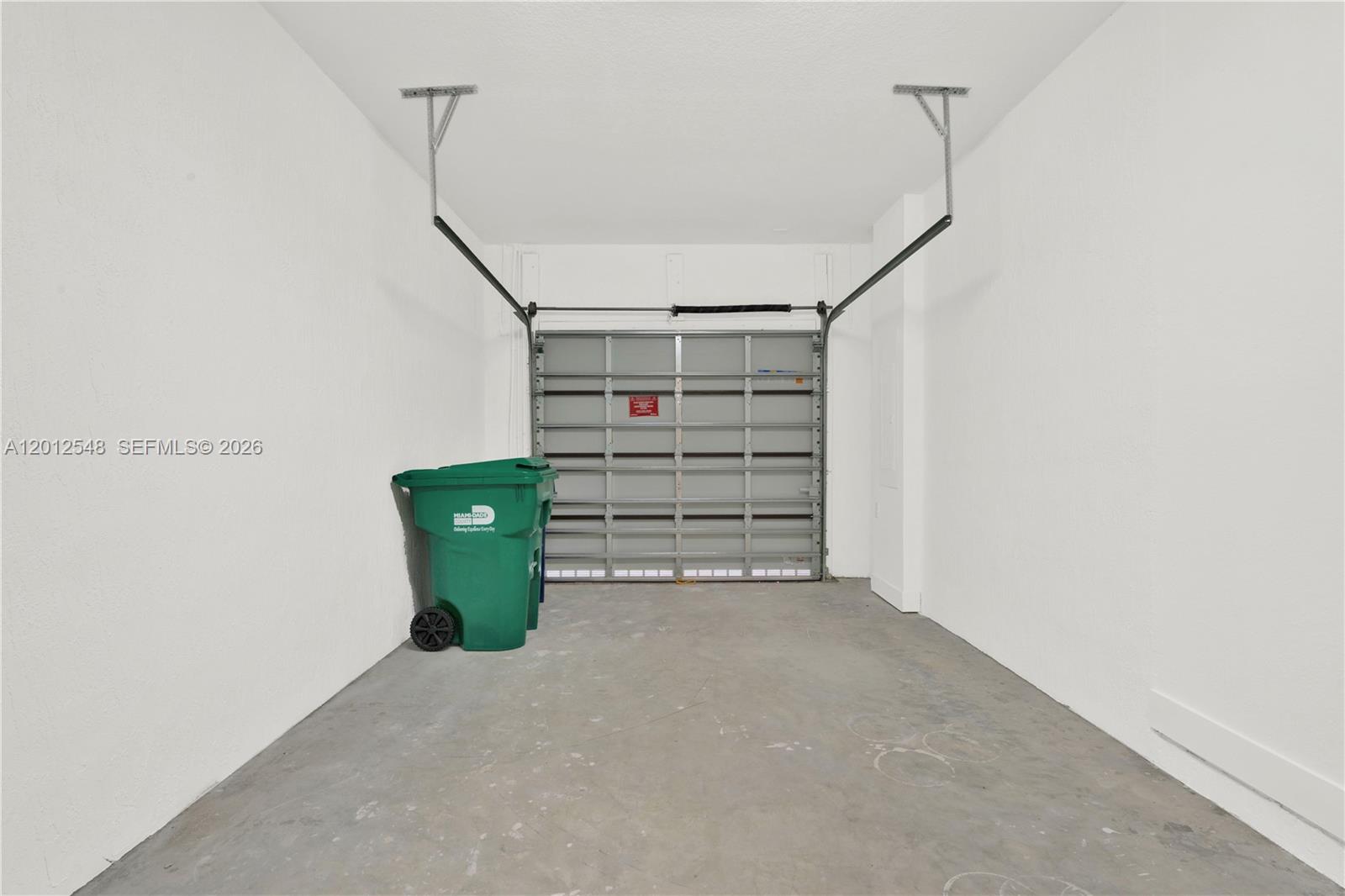 13642 Southwest 157th Place, Unit 13642 Miami, FL 33196 - Photo 37 of 41 a view of a room with storage and utility room