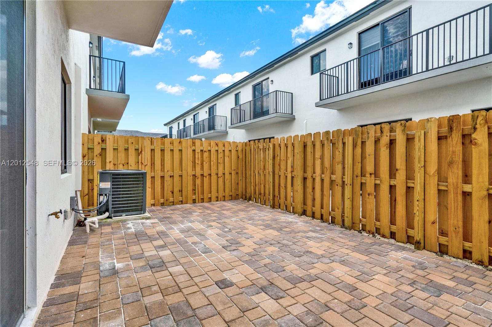 13642 Southwest 157th Place, Unit 13642 Miami, FL 33196 - Photo 38 of 41 a view of a porch