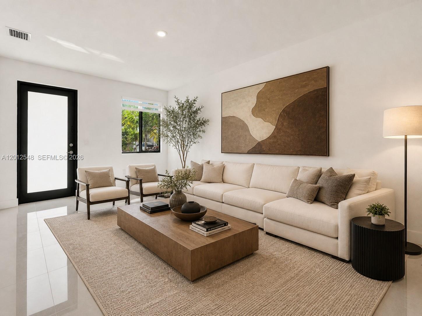 13642 Southwest 157th Place, Unit 13642 Miami, FL 33196 - Photo 5 of 41 a living room with furniture and a large window