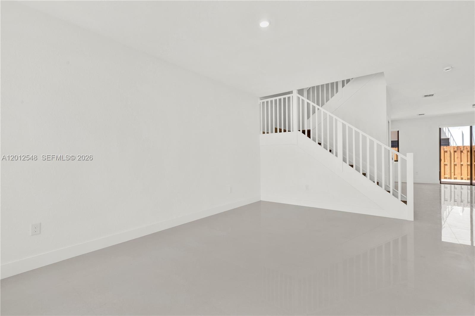 13642 Southwest 157th Place, Unit 13642 Miami, FL 33196 - Photo 8 of 41 a view of an entryway with stairs