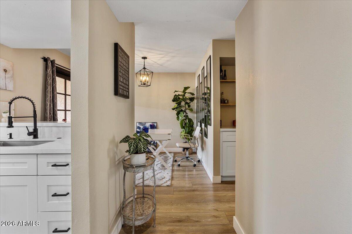 7510 East Thomas Road, Unit 216 Scottsdale, AZ 85251 - Photo 11 of 19 a view of living room with furniture and potted plant