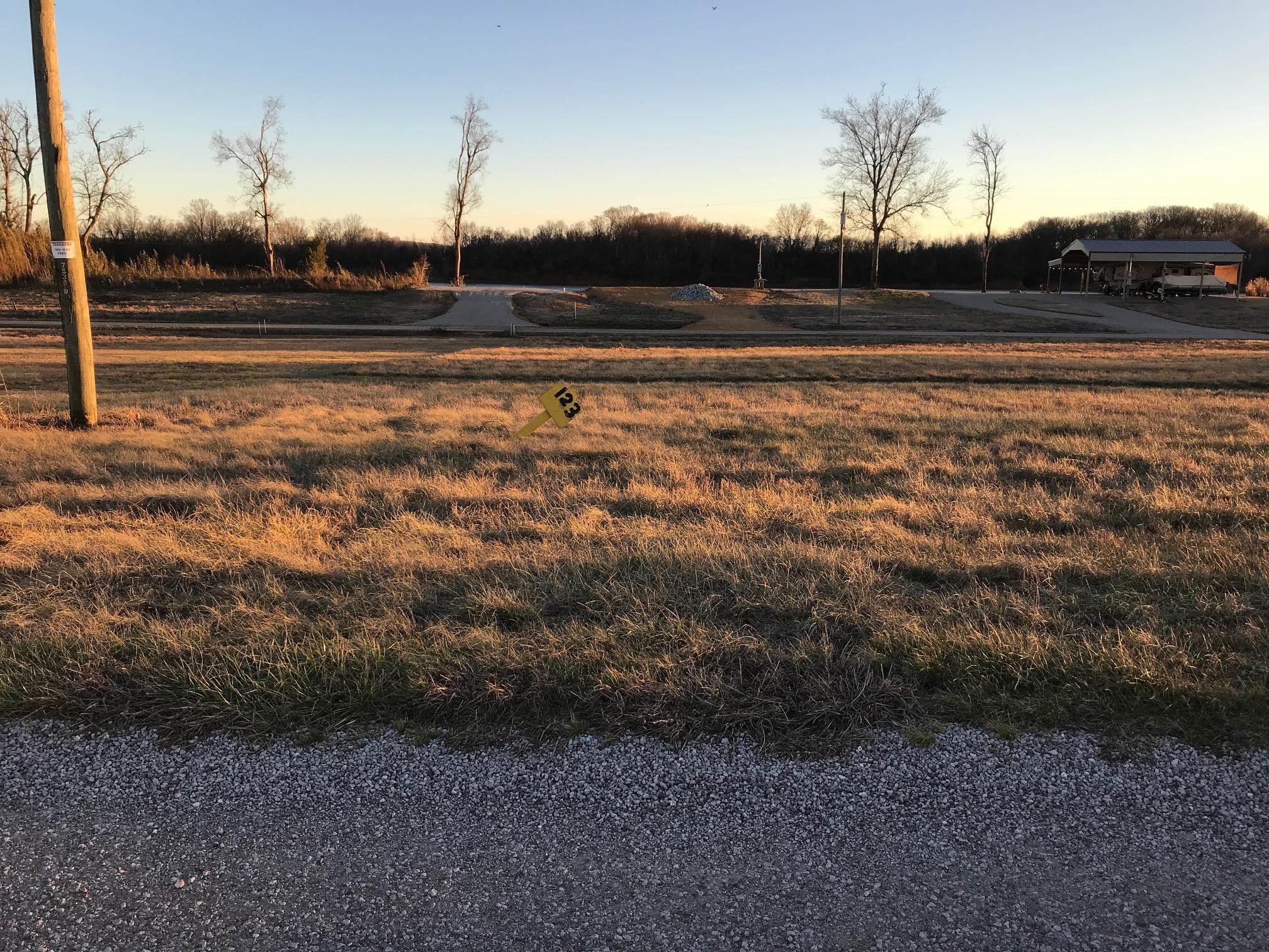 123 Catfish Lane Crump, TN 38327 - Photo 1 of 8 a view of a house with a yard