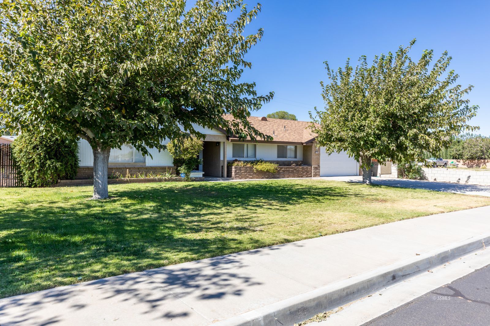 1125 South Norma Street Ridgecrest, CA 93555 - Photo 2 of 34 a view of a house with a swimming pool