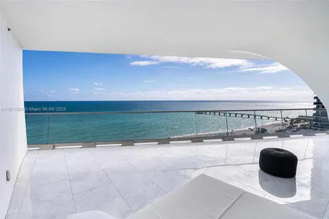 a view of a living room and bathroom