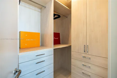 a bathroom with a shower sink and mirror