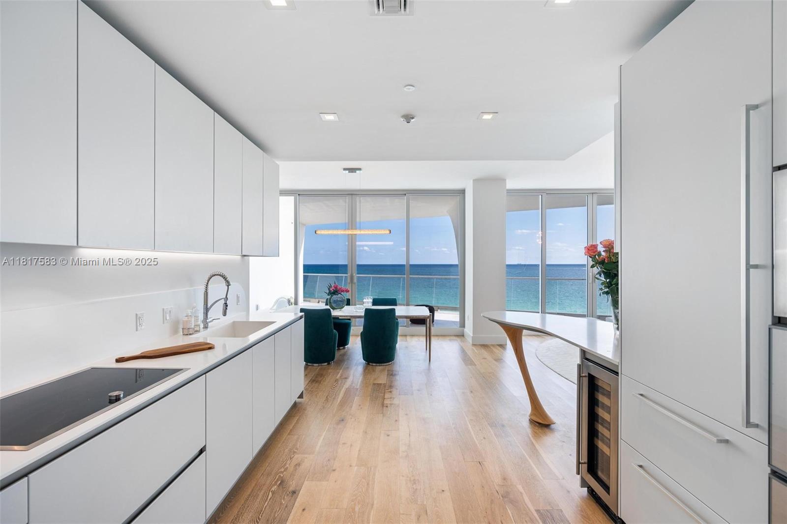 16901 Collins Avenue, Unit 902 Sunny Isles Beach, FL 33160 - Photo 4 of 52 a large kitchen with a lot of counter space