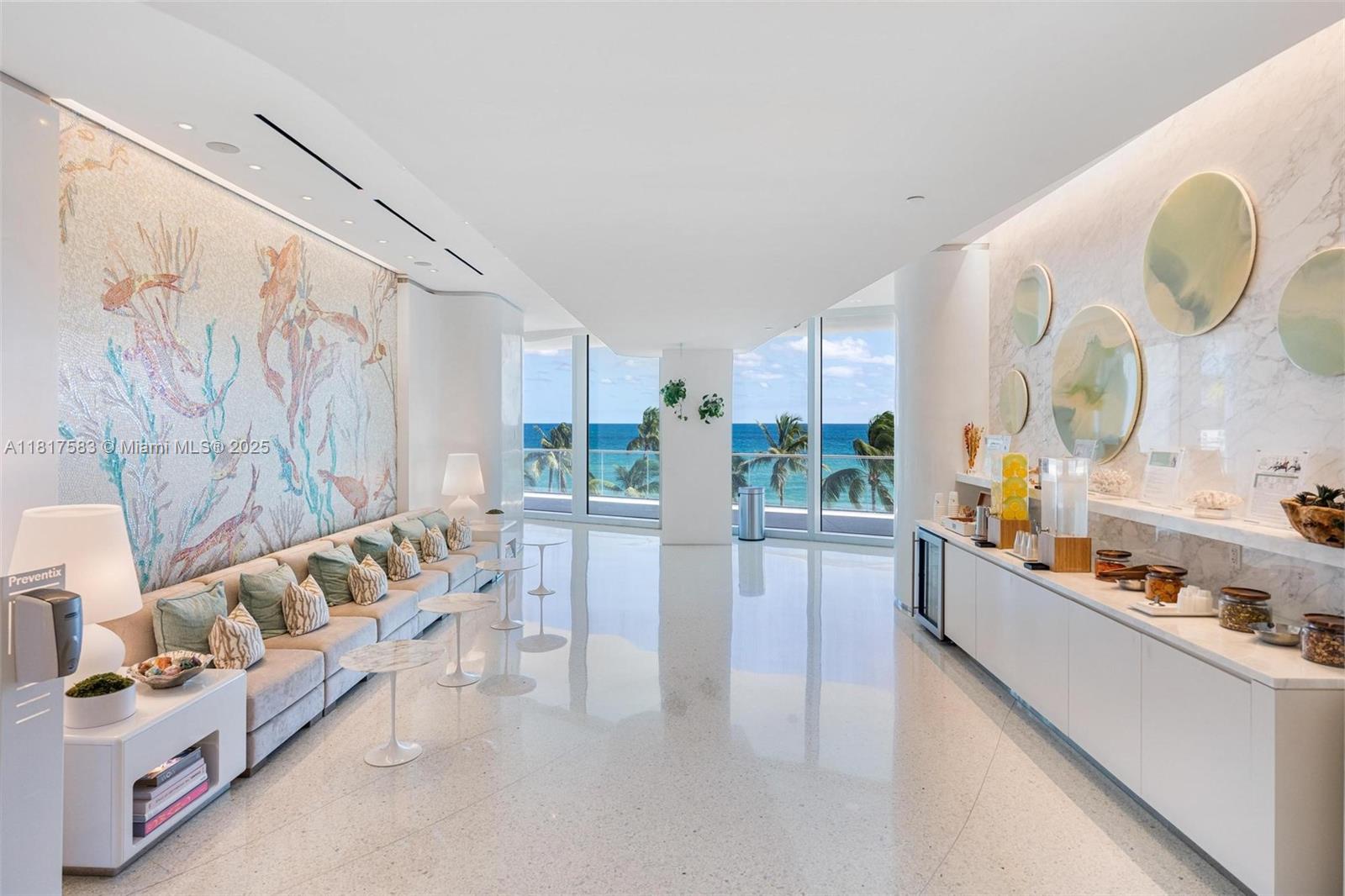 16901 Collins Avenue, Unit 902 Sunny Isles Beach, FL 33160 - Photo 46 of 52 a living room with furniture and a large window