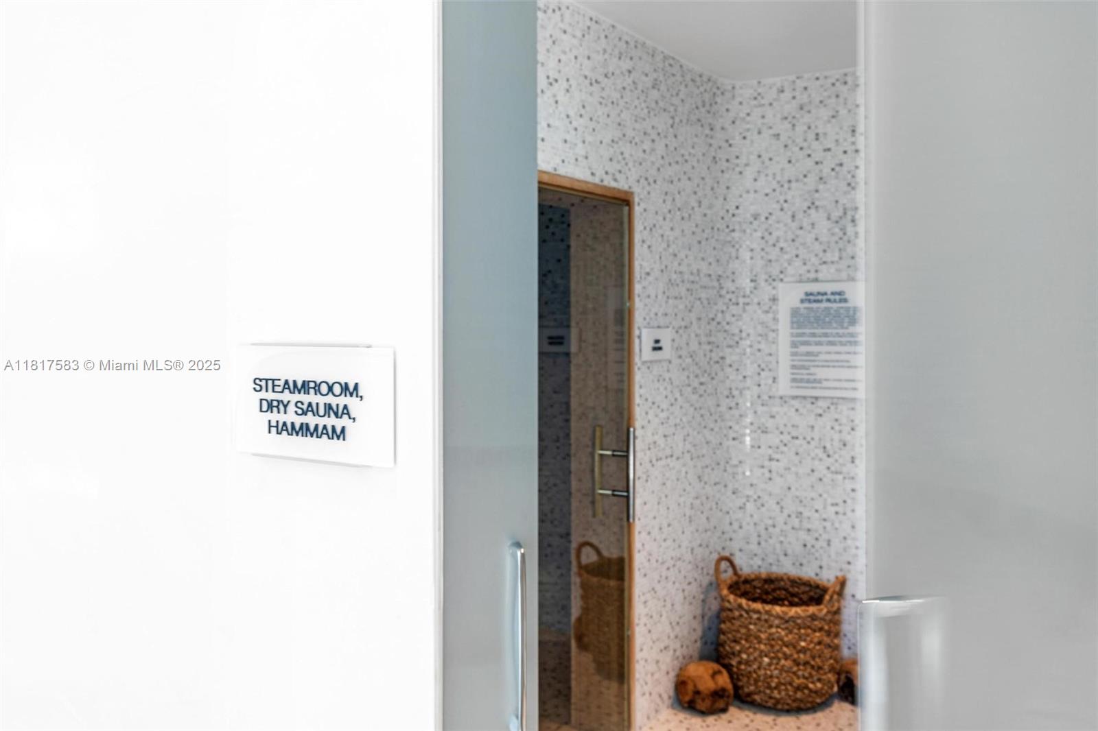 16901 Collins Avenue, Unit 902 Sunny Isles Beach, FL 33160 - Photo 48 of 52 a picture of a bathroom with a shower and a sink