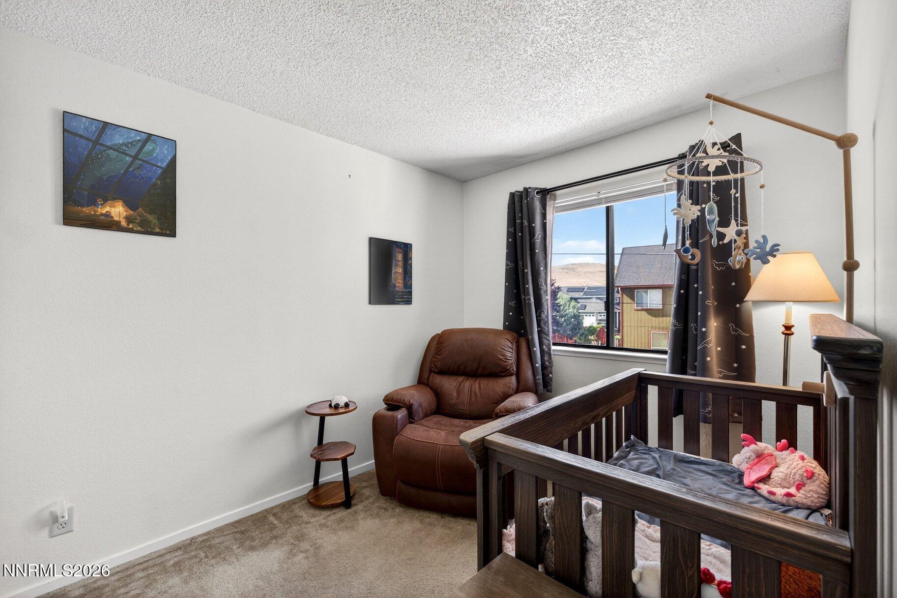 3415 Balboa Drive Reno, NV 89503 - Photo 22 of 61 a bedroom with furniture and a window