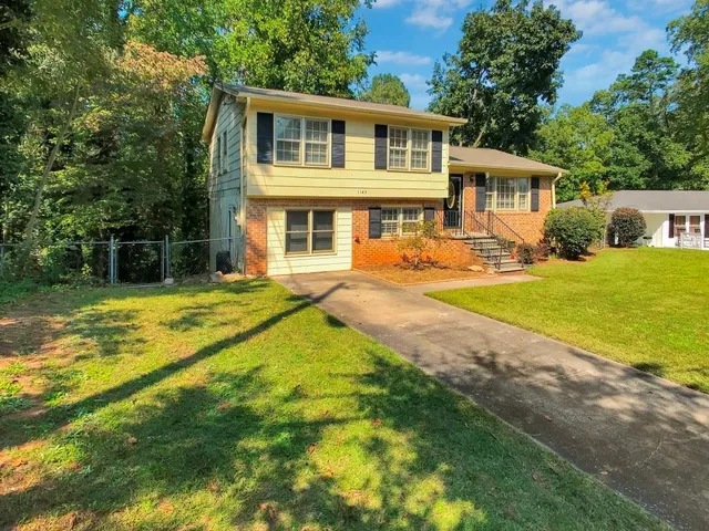 a front view of a house with swimming pool