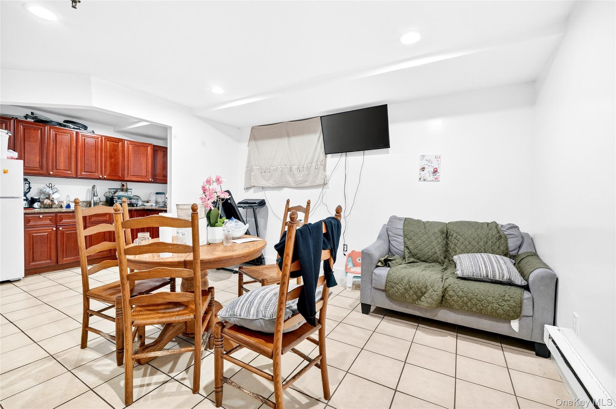 1459 Rosedale Avenue Bronx, NY 10460 - Photo 30 of 37 Dining area with a baseboard radiator, light tile patterned floors, and recessed lighting