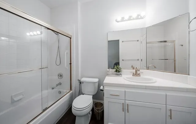 a view of storage and utility room with washer and dryer