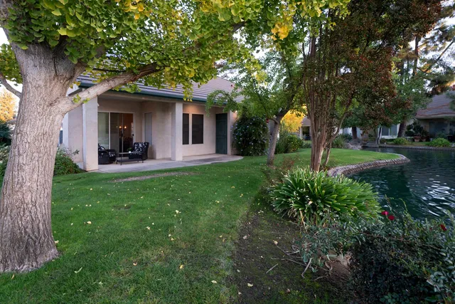 a view of pool with tree s