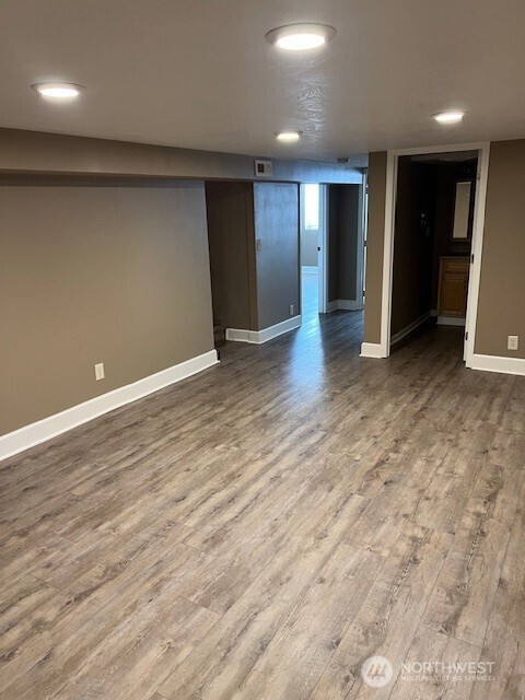 618 Cardinal Drive Walla Walla, WA 99362 - Photo 17 of 31 an empty room with wooden floor and closet