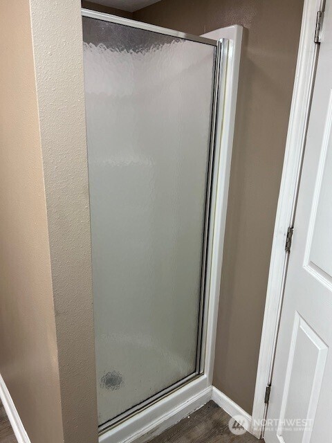 618 Cardinal Drive Walla Walla, WA 99362 - Photo 20 of 31 a bathroom with a glass shower door