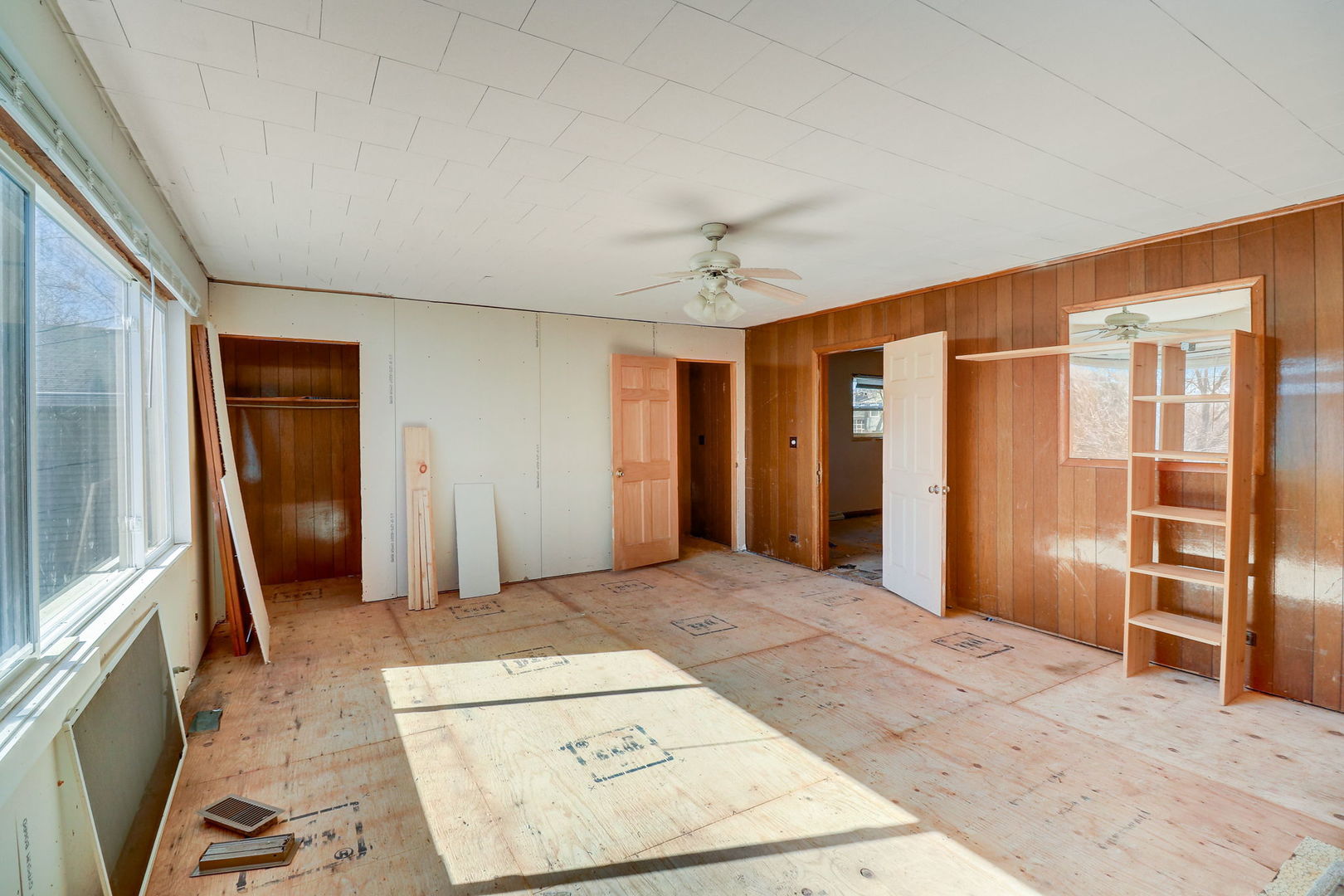 307 South Rosedale Court Round Lake, IL 60073 - Photo 17 of 41 a bedroom with a bed and a walk in closet