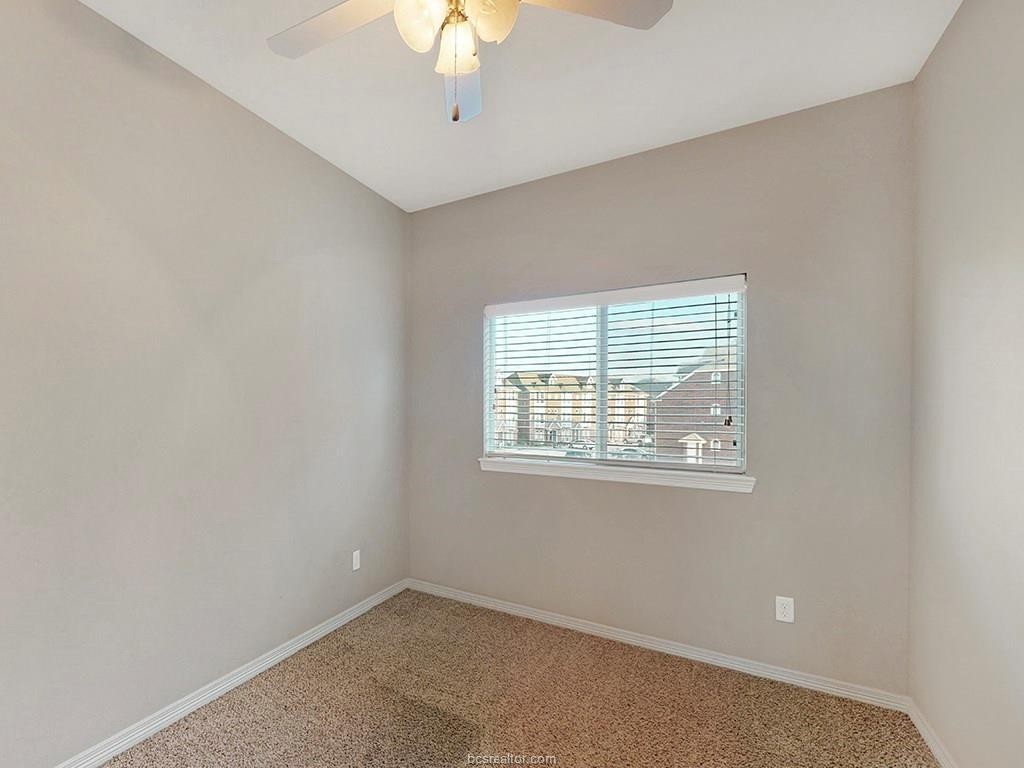1198 Jones-Butler Road, Unit 2607 College Station, TX 77840 - Photo 6 of 26 an empty room with a window