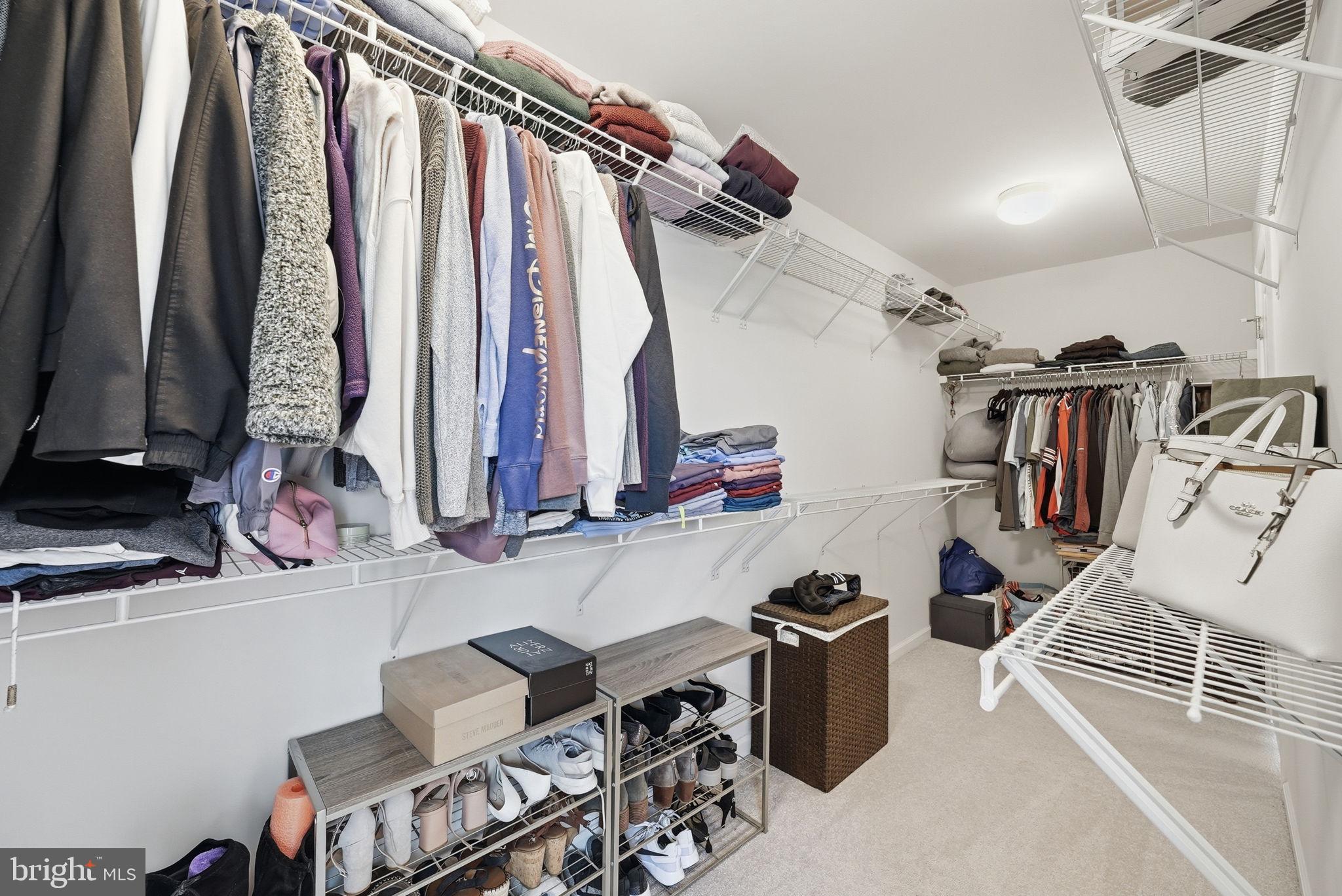 214 Shields Road Stafford, VA 22554 - Photo 28 of 47 Organized closet with stylish storage.